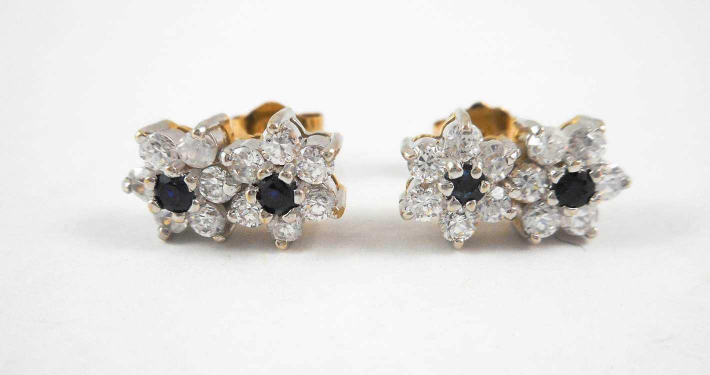 Appraisal: PAIR OF SAPPHIRE DOUBLE FLOWER STUD EARRINGS each k white