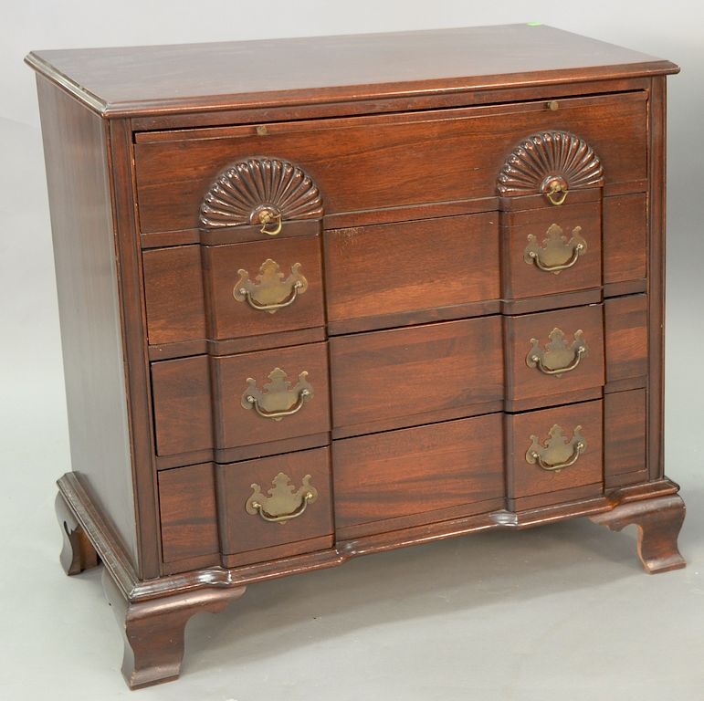 Appraisal: Mahogany Chippendale style block front chest with pull-out slide ht