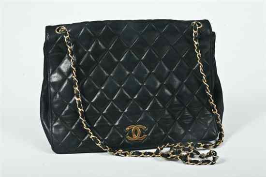 Appraisal: CHANEL BLACK QUILTED LEATHER HANDBAG Burgundy leather interior the underside