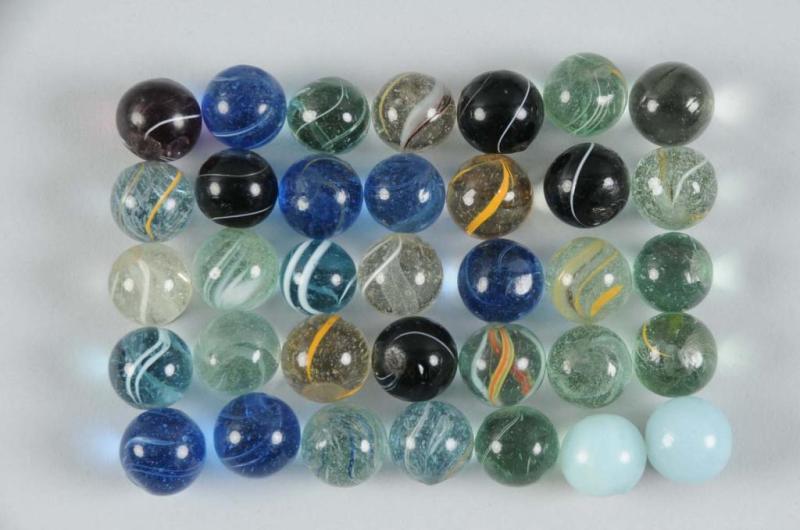 Appraisal: Assortment of Handmade Marbles Description Includes approximately marbles most of