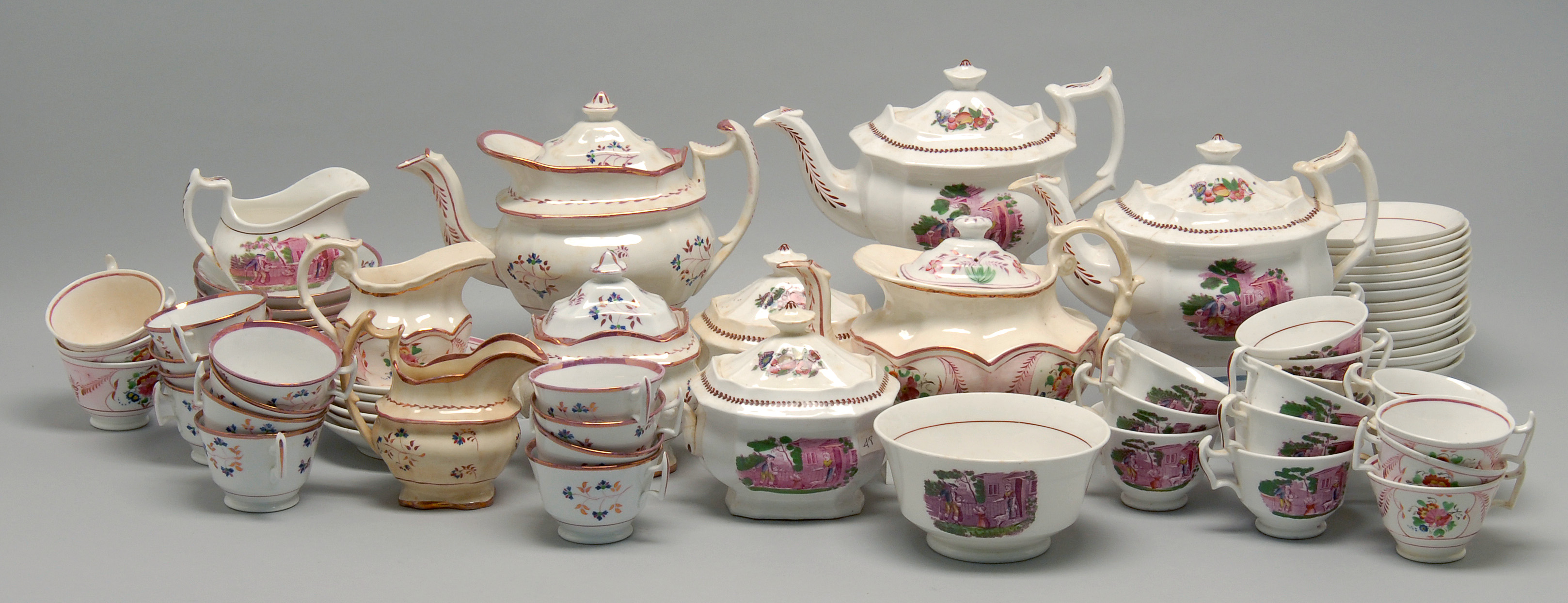 Appraisal: THREE ENGLISH PORCELAIN PARTIAL TEA SERVICES All unmarked Two lustre-decorated