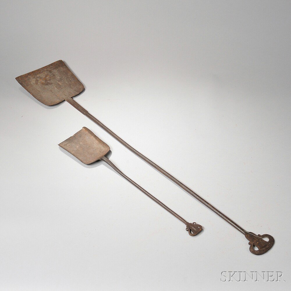 Appraisal: Wrought Iron Shovel and Peel with Ram's-head Finials America late