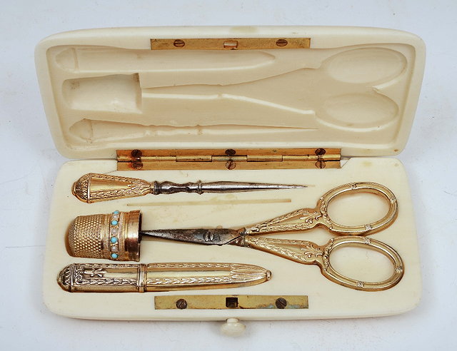 Appraisal: A GEORGIAN SILVER GILT ETUI in ivory case with thimble