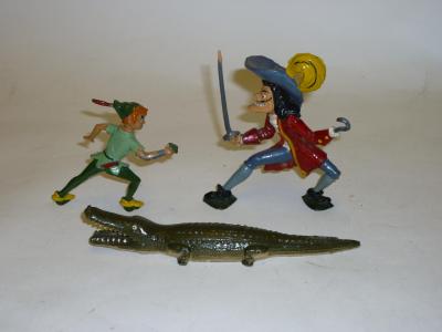 Appraisal: An English metal set Peter Pan Captain Hook and Crocodile