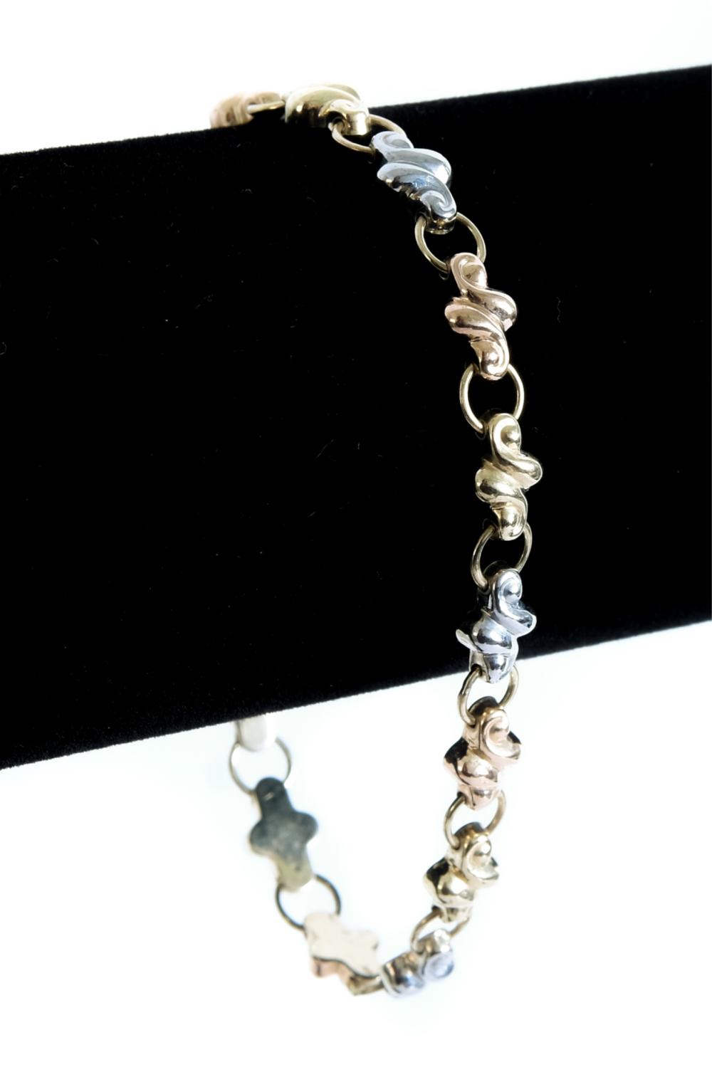 Appraisal: K YELLOW ROSE AND WHITE GOLD BRACELET k three tone