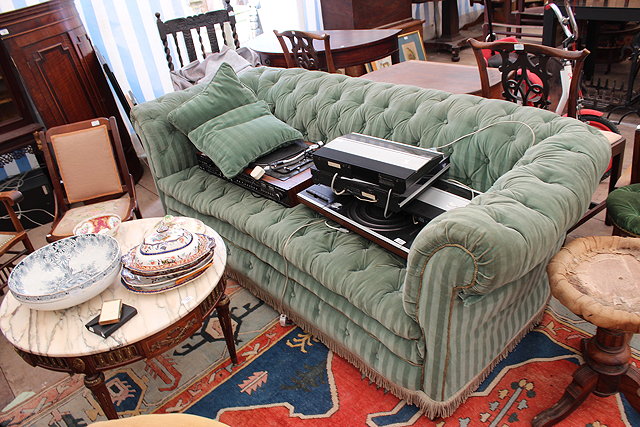 Appraisal: A GREEN BUTTON BACK UPHOLSTERED CHESTERFIELD STYLE SOFA cm wide