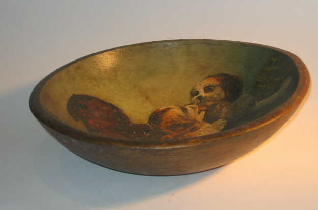 Appraisal: HAND PAINTED WOODEN BOWL The interior painted with three puppies