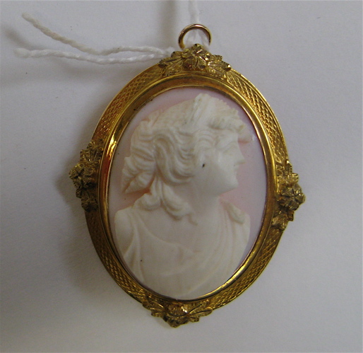 Appraisal: PORTRAIT CAMEO PENDANT BROOCH with oval shaped pale pink with