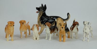 Appraisal: A collection of Beswick dogs including Alsatian Beagle retriever small