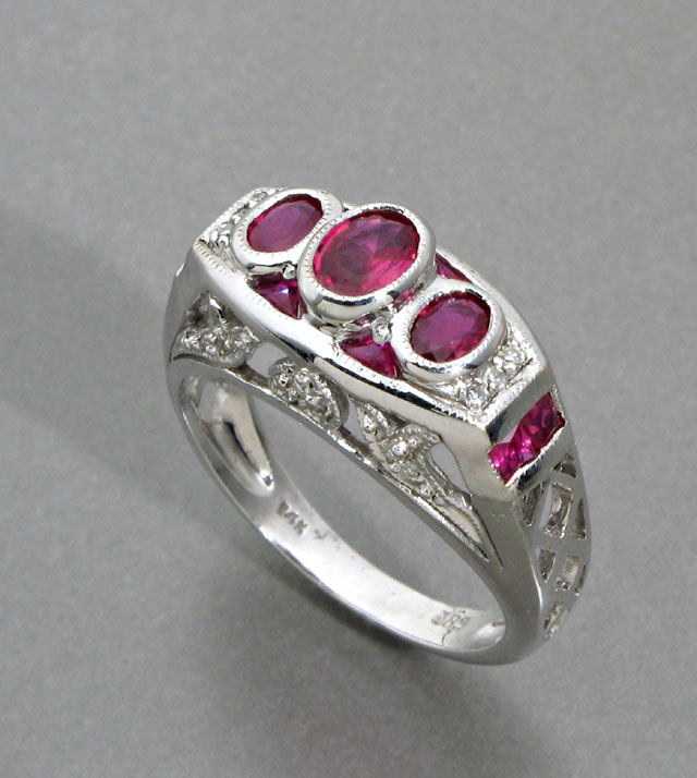 Appraisal: DIAMOND RUBY AND FOURTEEN KARAT WHITE GOLD RING featuring three