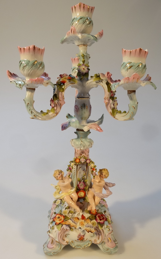 Appraisal: An early thC Sitzendorf porcelain four branch candelabra with floral