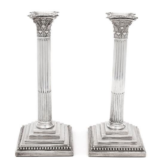 Appraisal: A Pair of English Weighted Silver Columnar Candlesticks William Hutton