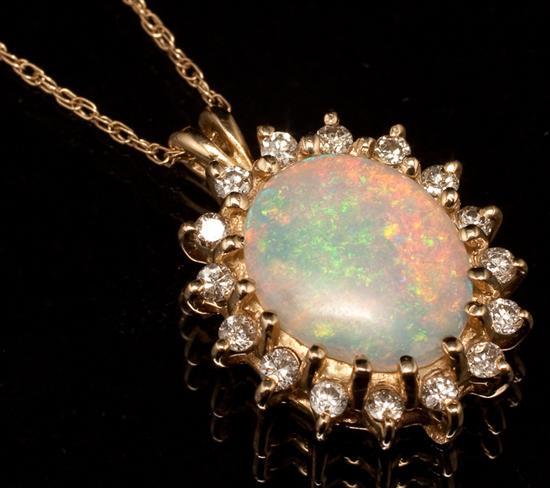 Appraisal: White opal and diamond pendant suspended from a K gold