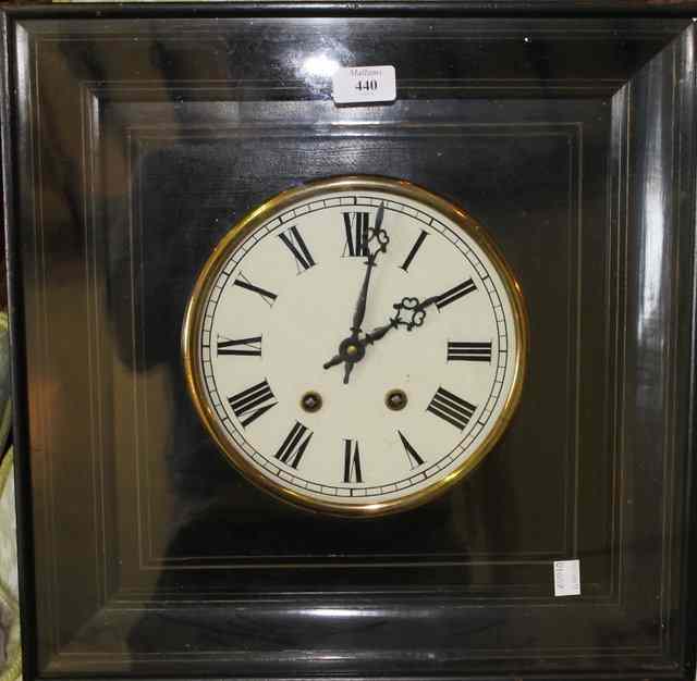 Appraisal: A VICTORIAN WALL CLOCK of square cut form in black