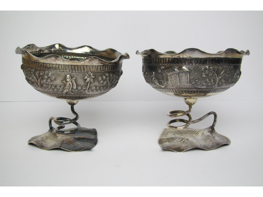 Appraisal: A pair of Eastern white metal bowls of leafy stem