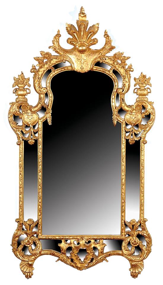 Appraisal: Continental carved giltwood and gesso looking glass scrolling divided frame