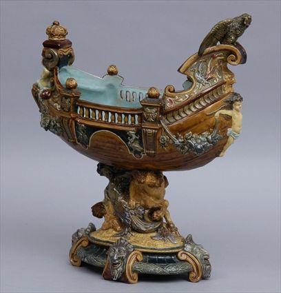 Appraisal: CONTINENTAL MAJOLICA BOAT-FORM CENTERPIECE The balustraded hull with eagle prow