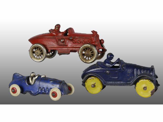 Appraisal: Lot of Cast Iron Race Car Toys Description Small rubber