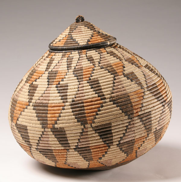 Appraisal: Hand woven basket multi-color coil design H Good condition