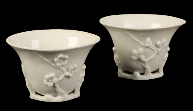 Appraisal: A PAIR OF CHINESE BLANC DE CHINE LIBATION CUPS Qing