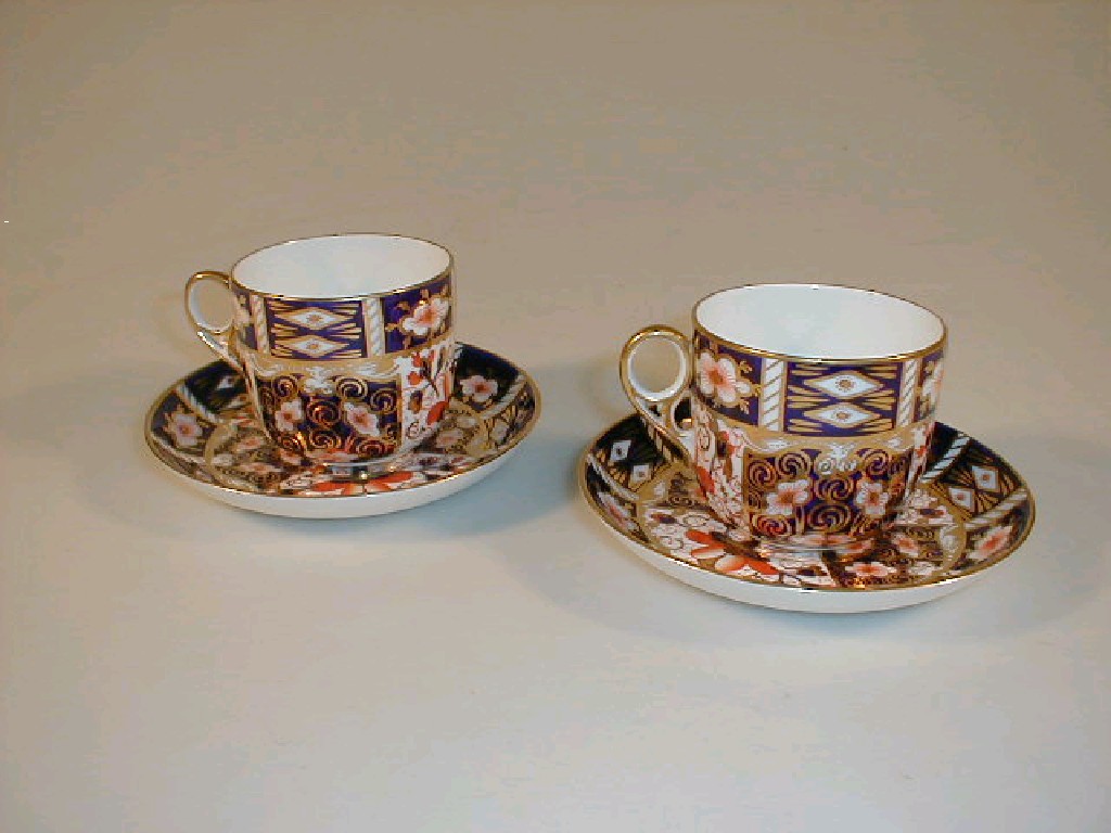 Appraisal: Two Royal Crown Derby cups and saucers with Imari decoration