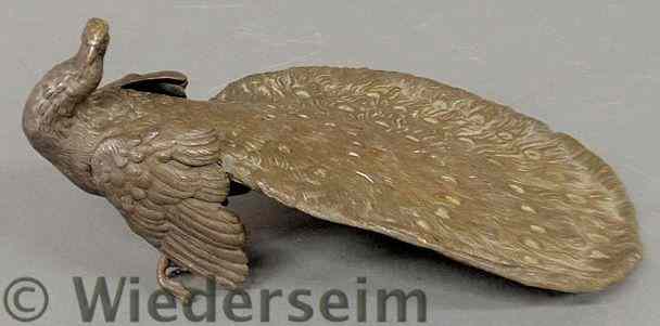 Appraisal: Austrian bronze peacock c with fanned out tail feathers unsigned