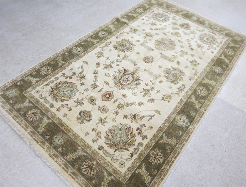 Appraisal: HAND KNOTTED ORIENTAL CARPET Indo-Persian floral and floral arabesque decoration