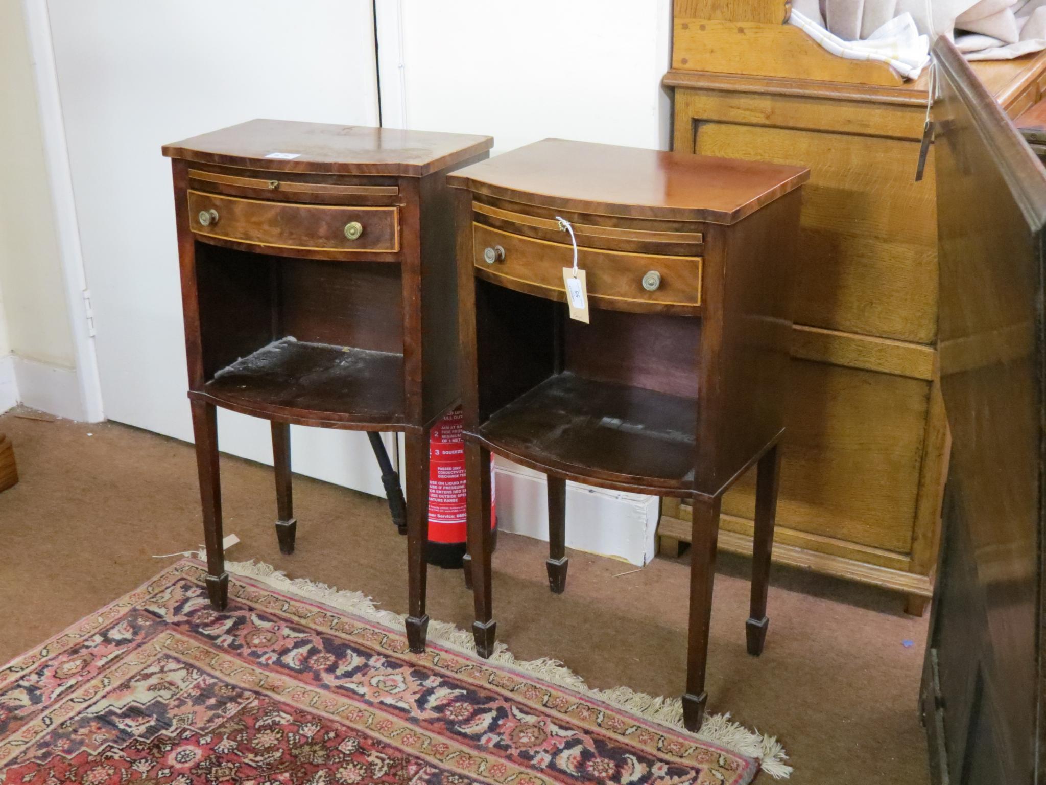 Appraisal: A pair of Edwardian inlaid mahogany bedside tables bow-fronted each