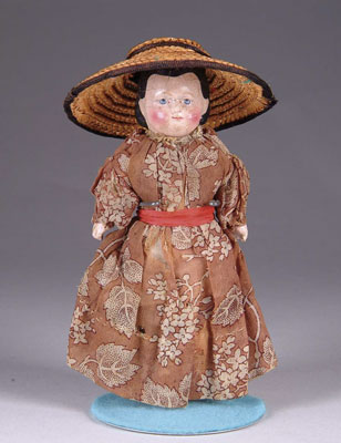 Appraisal: PAPIER MACHE DOLL A fine little Greiner style papier-mache with