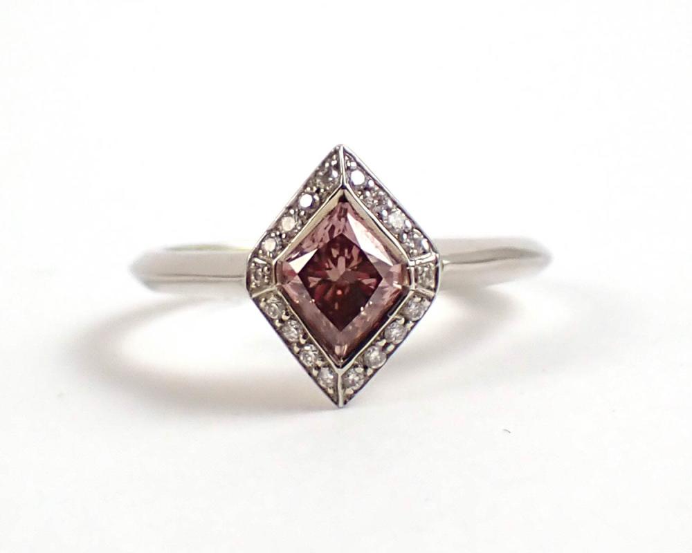 Appraisal: PINK DIAMOND WHITE DIAMONDS AND EIGHTEEN KARAT WHITE GOLD RING