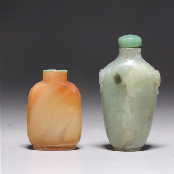 Appraisal: Two antique Chinese snuff bottles including agate and jadeite each