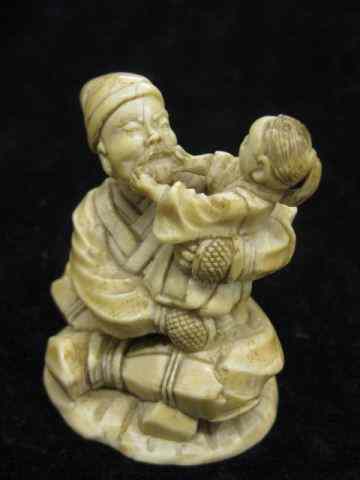 Appraisal: Carved Ivory Figure of an Old Man seated with child