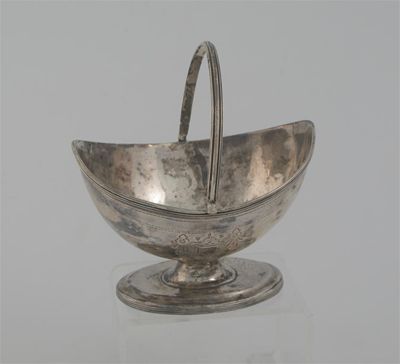 Appraisal: A small George III boat shaped sugar basket with reeded