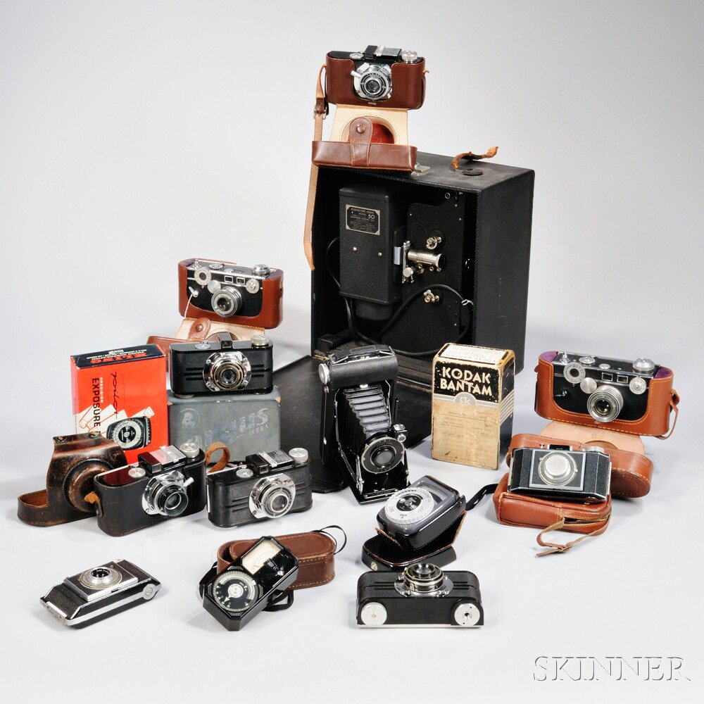 Appraisal: Group of Cameras and Accessories including three Kodak Bantam f