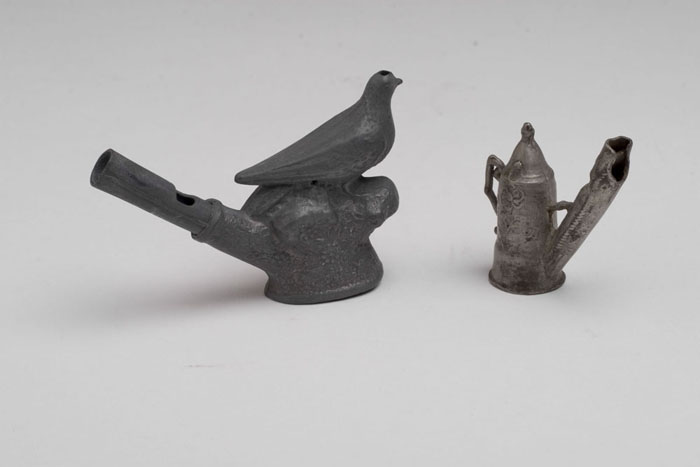 Appraisal: TWO ENGLISH PEWTER BIRD WHISTLES One in the form of