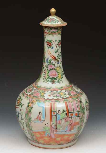 Appraisal: A CHINESE CANTON BOTTLE VASE and cover with panels of