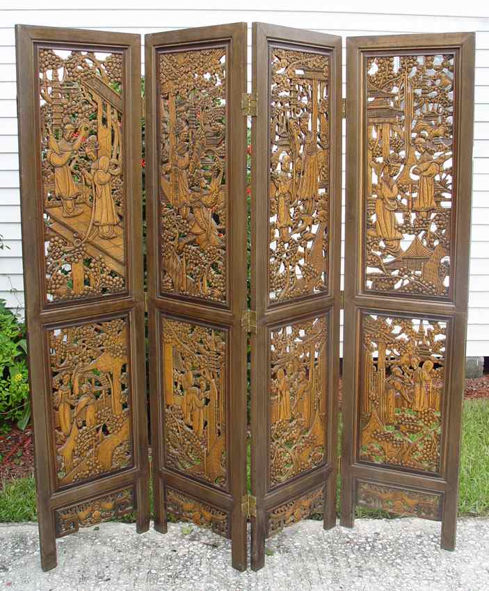 Appraisal: CHINESE CARVED PANEL SCREEN Pierce carved with oriental genre scenes