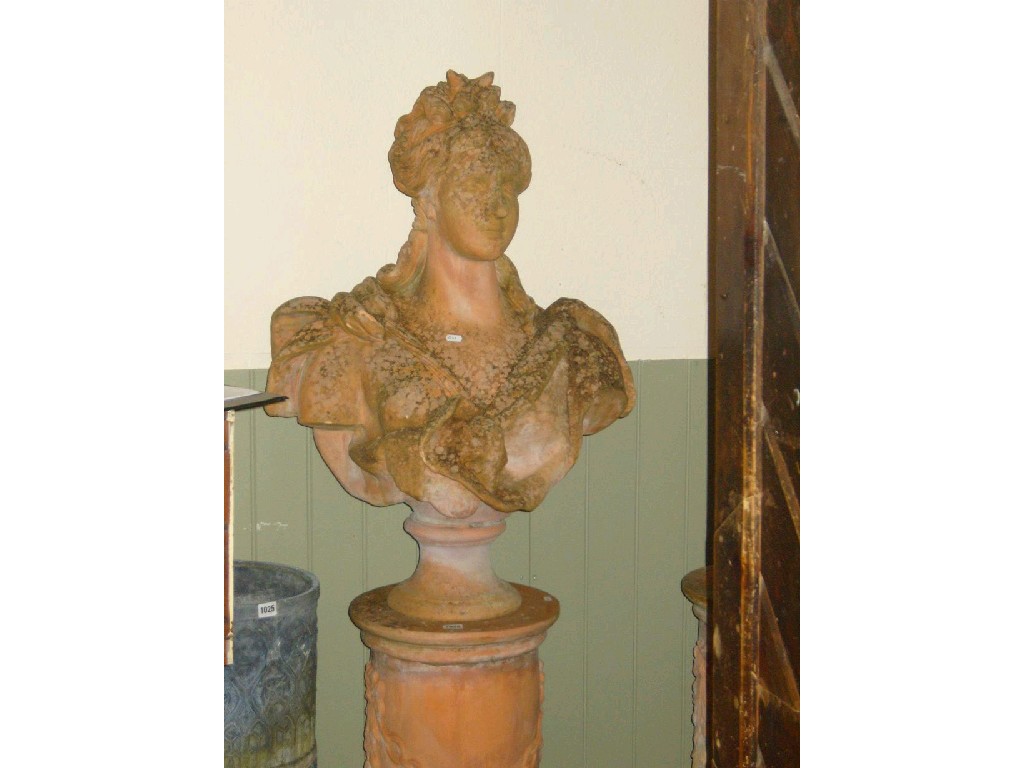 Appraisal: A pair of terracotta busts on stands of classical style