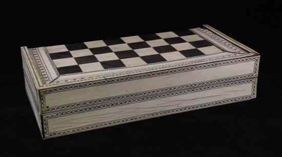 Appraisal: A mid th century Vizagapatam ivory and rosewood chess board