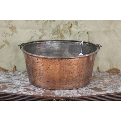 Appraisal: Large antique French copper swing handled pot approx cm H