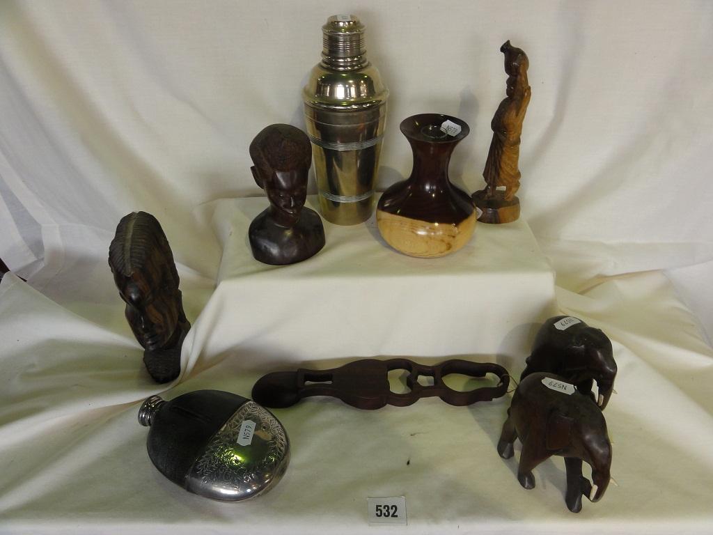 Appraisal: A miscellaneous collection of African wooden carvings including a man