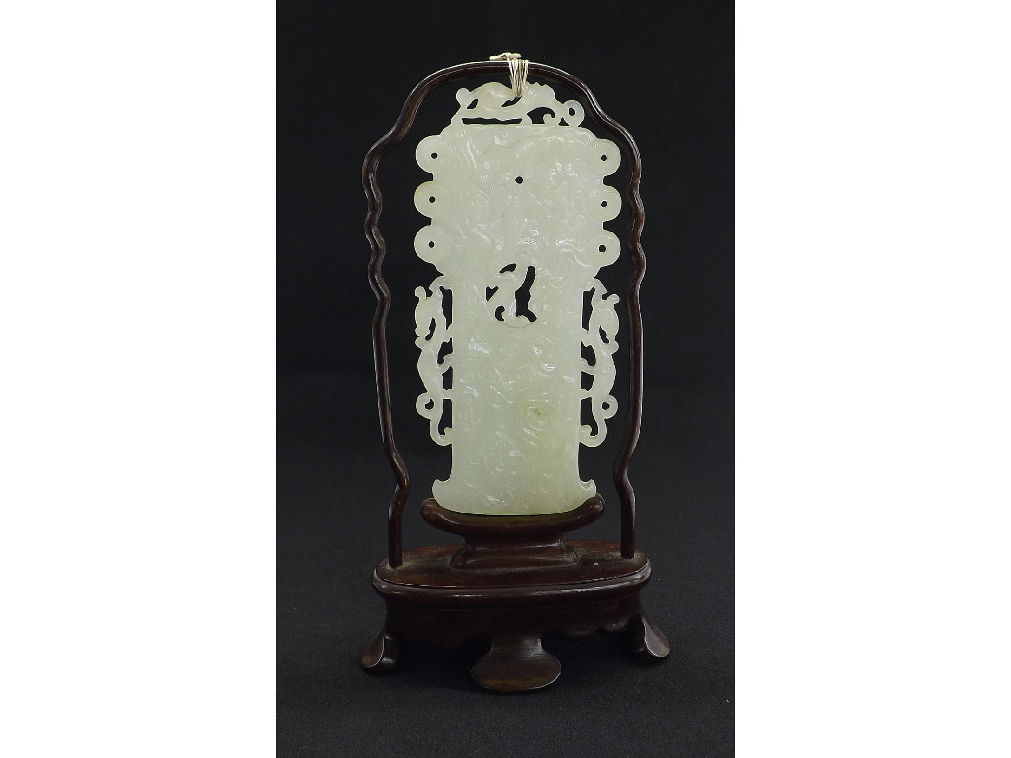 Appraisal: Good white jade pendant carved and pierced overall with mythical