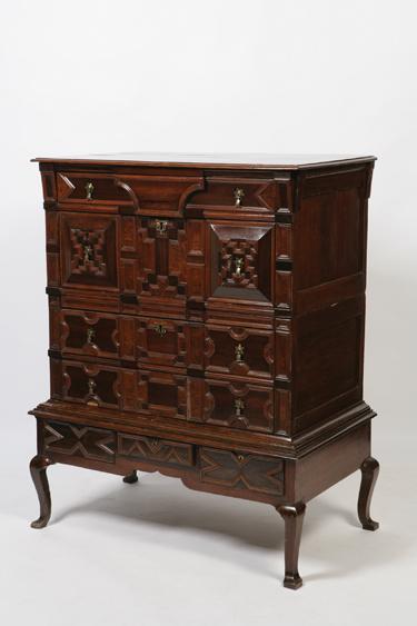 Appraisal: AN ANGLO-DUTCH WALNUT CHEST ON STAND the rectangular top with