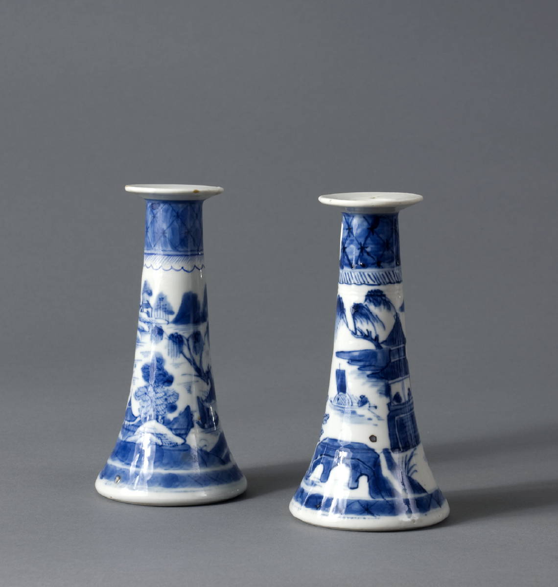 Appraisal: PAIR OF CANTON BLUE AND WHITE PORCELAIN CANDLESTICKS Height inches