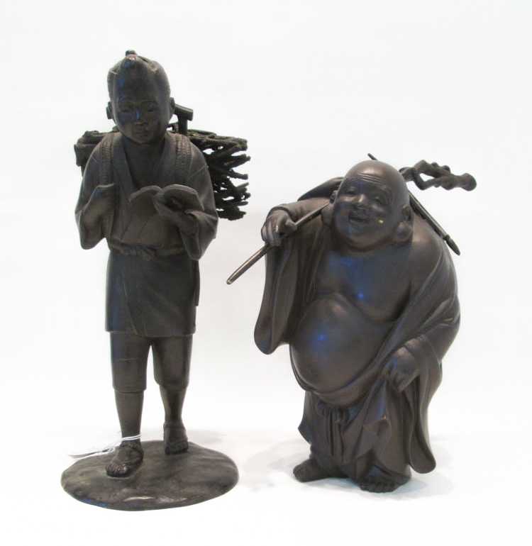 Appraisal: TWO BRONZE FIGURAL SCULPTURES both depicting Asian men walking and