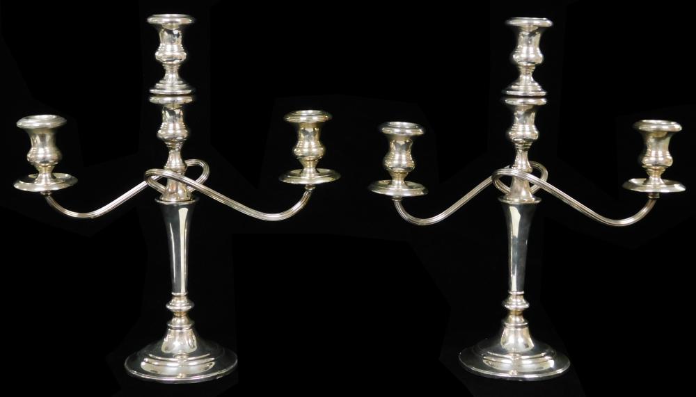 Appraisal: STERLING Pair of American weighted sterling candelabra by Fisher Silversmiths