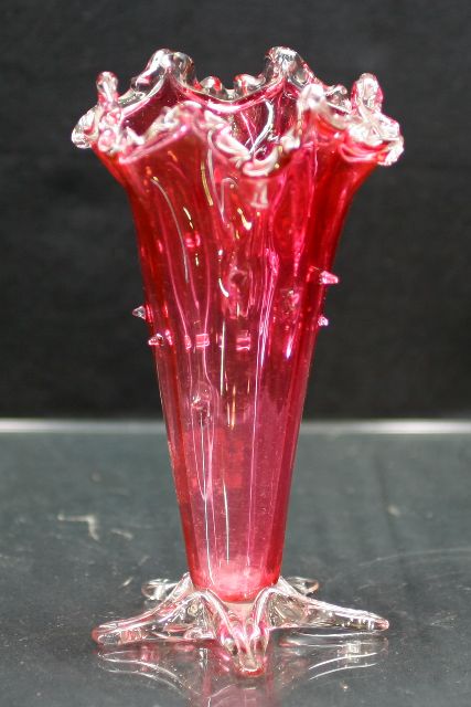 Appraisal: Victorian cranberry glass conical vase on radiating clear foot