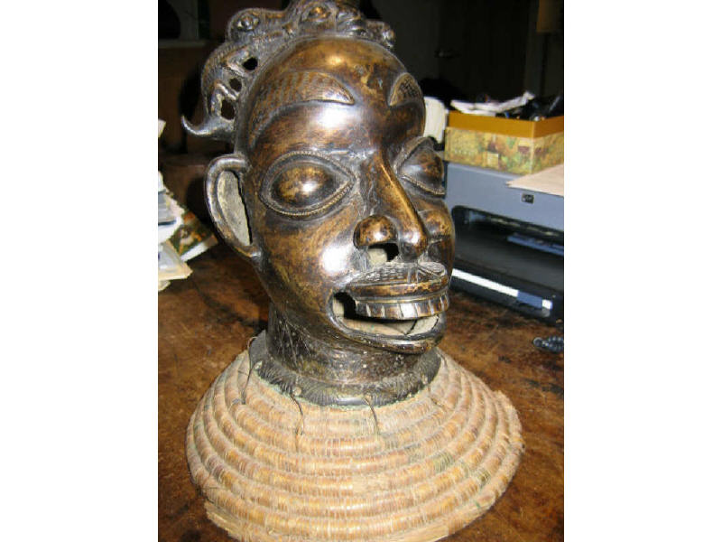 Appraisal: AFRICAN CAST BRONZE MALE HEAD Finely cast with deeply recessed