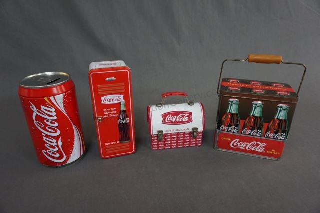 Appraisal: Coca-Cola Tin Grouped Lot Tins resemble bottle carton lunch box