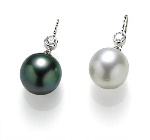 Appraisal: A pair of South Sea cultured pearl and diamond earrings